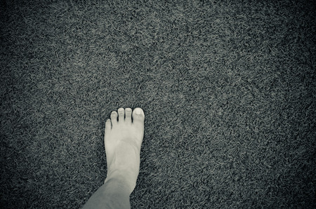 foot on artificial grass, top view, selfieの写真素材