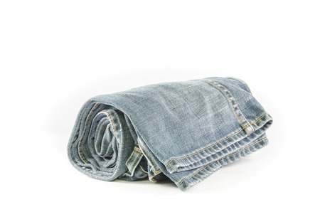 A Rolls of Blue Jeans isolated on white backgroundの写真素材