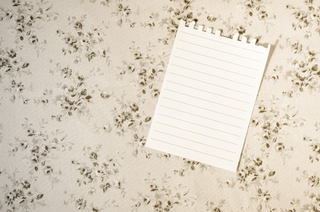 A white empty sheet on tablecloth for write food recipesの写真素材