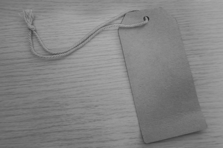 the blank price tag label on wooden backgroundの写真素材