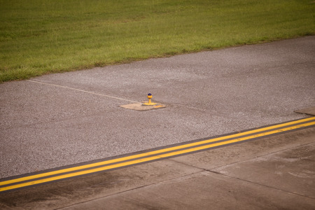 the airport markings on concreteの写真素材