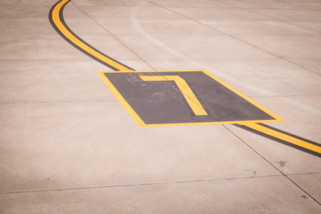 the airport markings on concreteの写真素材