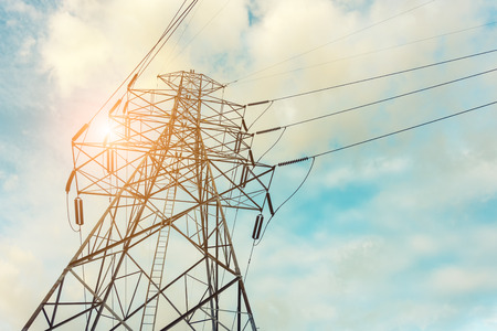 High voltage towers on skies background, Transmission line tower.の写真素材