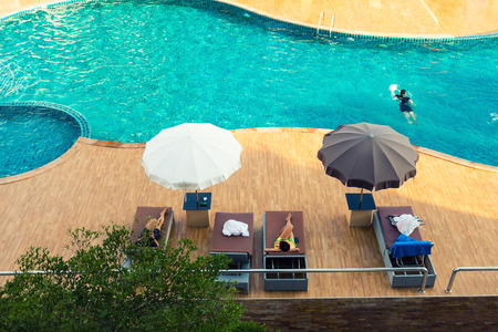 Luxury swimming pool and blue water on top view.の写真素材