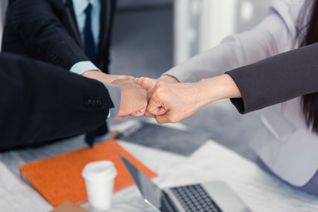 Asian team business and partners business giving fist bump after agreement deal complete., Business conceptの写真素材