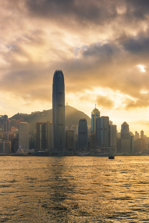 Hong Kong victoria harbor at golden hour of sunset scene.の写真素材