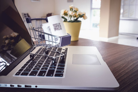 Shopping online concept, Mini trolley on keyboard laptop.の写真素材