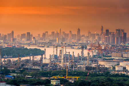 Refinery plant and urban in sunset scene., Bangkok cityscape.