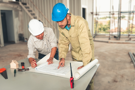 Project engineer team of construction industrial in site erection.,Project management team of engineer and architect planing for new project., Business construction and heavy industry concept.の写真素材