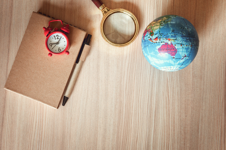 Travel explorer or vacation planning trip mockup top view., Tourist plan layout with personal accessories on table top., Holiday and adventure concept., Blogger copy space vintage.の写真素材