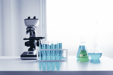 Scientist research laboratory equipment tools in Lab room secure., Microscope and testing beakers on a tabletop., Technology of Biotechnology, Science, Chemistry., Business science and medicine.の写真素材