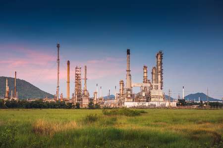 Landscape of Oil and Gas Refinery Manufacturing Plant., Petrochemical or Chemical Distillation Process Buildings., Factory of Power and Energy Industrial at Twilight Sunset., Engineering Petroleum.の写真素材