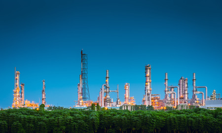 Landscape of Oil and Gas Refinery Manufacturing Plant., Petrochemical or Chemical Distillation Process Buildings., Factory of Power and Energy Industrial at Twilight Sunset., Engineering Petroleum.の写真素材