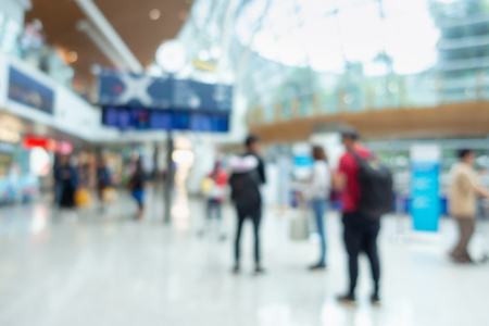 Abstract Defocus Motion Blurred in Airport Terminal, Travelers Tourist Waiting at Boarding Gate Before Departure.の写真素材