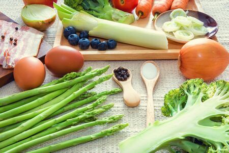 Healthy Nutrition Vegetable Food and Kitchen Cuisine Concept, Raw Ingredients Vegetarian Natural Food for Healthy Eating. Fresh Meal Preparation for Cooking, Mix Fruits and Vegetables on The Table.の写真素材