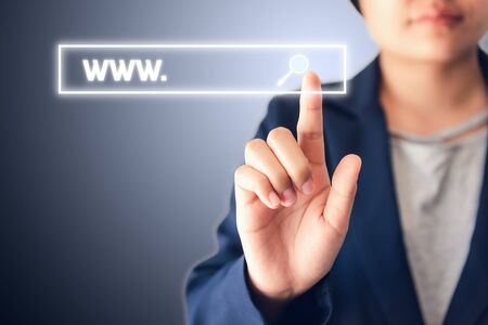 Technology Communication Network and Search Engine System Concept, Business Woman is Touching Internet Web Browser and Searching WWW on The Screen., Information Display and Connection Networkingの写真素材