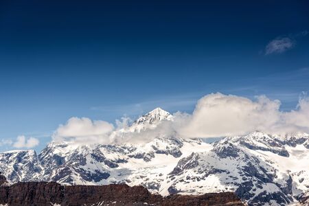 Beautiful Natural Landscape Scenery View of Mountain Swiss Alps at Zermatt, Switzerland. Nature Scenic Outdoor of Europe Mountains Alpine Against Blue Sky Background, Travel Destination of Switzerlandの写真素材