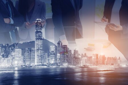 Business People Entrepreneurs Team are Meeting Discussing and Brainstorming Their Project Together in Conference Room. Double Exposure of Entrepreneurship Teamwork are Business Deal Meeting Togetherの写真素材