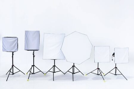 Studio Spotlight for Shooting Photographic or Movie Entertainment, Flash Light Studio Set and Space for Professional Digital Photographer. Illuminated Lights Equipment for Indoors Portrait Photographyの写真素材