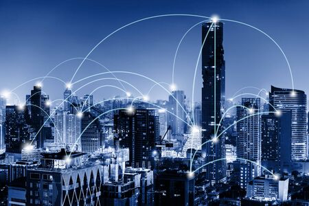 Network Telecommunication and Communication Connect Concept, Connection 5G Networking System of Infrastructure and Cityscape at Night Scenery. Technology Digital Connectivity and Information Transferの写真素材