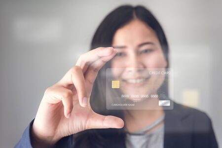 Technology Digital Connection and Business Credit Banking Concept, Business Woman is Using Credit...