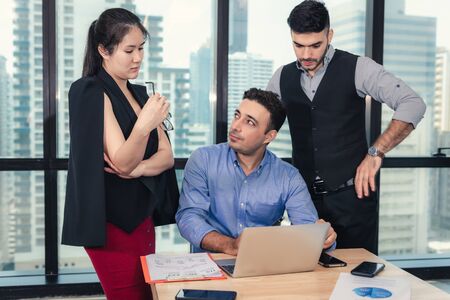 Businesspeople Teamwork are Seriously During Meeting Together, Business Man Having Upset While Looking Result of Business Profit. Management Leader is Dissatisfied About Project Their Team Executionの写真素材