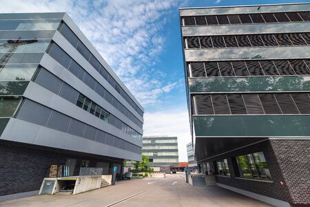Modern Architecture and Contemporary Facade Building Design, Geometric Structure of Office Business Building, Cityscape of Urban Downtown District at Zurich, Switzerland.の写真素材