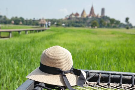 Woman Straw Hat With Landscape Scenery View at Coffee Shop. Relaxation Travel Place and Leisure Activity Conceptの写真素材