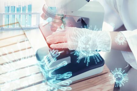 Medical Technologist or Chemical Scientist Working in Laboratory Room, Female Researcher Medicine Microbiology Using Microscope for Experiment Testing and Analysis Coronavirus Disease. Science Labの写真素材