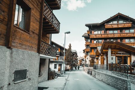 Landscape Scenery View Old Town Valley of Zermatt City, Switzerland. Cityscape Scenic of Traditional Architecture of Swiss Culture Against Mountain Alps. Travel Destination and Europe Vacation.の写真素材