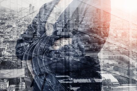 Business Construction Engineering and Building Architecture Concept, Double Exposure Image of Leadership Engineer Woman With City Infrastructure Construction, Architect Manager Building Project の写真素材