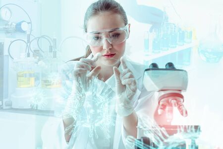 Medical Scientist Researcher Using Microscope in Laboratory,  Medicine Specialist Studying and Experiment Anti Virus Pharmaceutical With Microscopic. Lab Research and Technology Health Care Concept.の写真素材