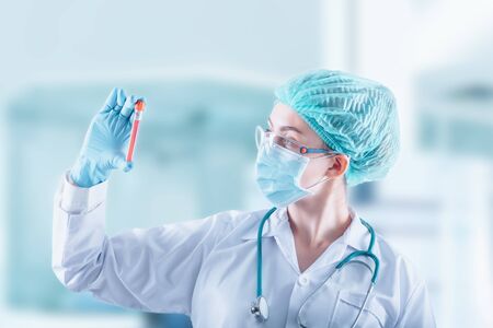 Coronavirus Covid-19 Lab Rapid Sample Test Concept, Medical Laboratory or Doctor Analyzing Corona Virus Patient Blood in Hospital Laboratory Room. Covid19 Diagnostics and Medicine Clinical Health Careの写真素材