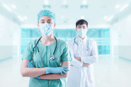Medical Patient Healthcare and Doctor Occupation Concept, Medicine Physician Doctor Team in Hospital Clinic Health Care. Cardiologist Specialist Doctors Teamwork on Examining Patients Background.の写真素材