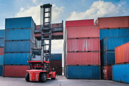 Container Cargo Port Ship Yard Storage Handling of Logistic Transportation Industry. Row of Stacking Containers of Freight Import/Export Distribution Warehouse. Shipping Logistics Transport Industrialの写真素材
