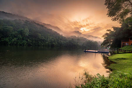 Landscape Scenery View of Mountain Range Against Blue Sky Background at Sunrise, Scenic Tranquil Nature With Beautiful Lake at The Morning. Panoramic Nature Outdoorsの写真素材