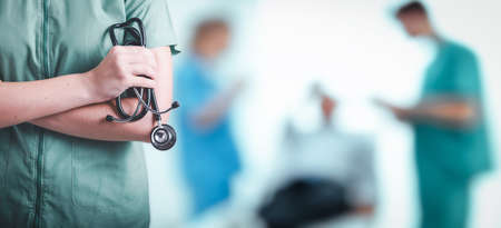 Medical Patient Healthcare and Doctor Occupation Concept, Medicine Physician Doctor With Stethoscope in Hospital Clinic Health Care. Cardiologist Specialist Doctors on Examining Patients Background.の写真素材