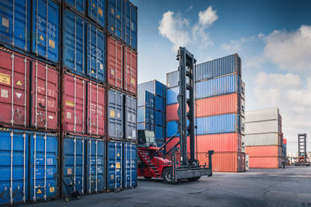 Stack of Containers Cargo Ship Import and Export in Harbor Port, Cargo Freight Shipping of Container Logistics Industry.の写真素材