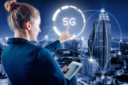 Technology Innovation 5G Networking System Concept, Business Woman Pressing 5G Button Media...