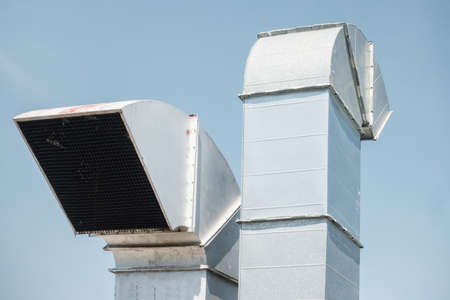 Duct Blower for Air Ventilation Smoke Exhaust Over Roofing of Shopping Mall, Air Ventilations Equipment and Flowing System. Exhausting Air Suctionの写真素材