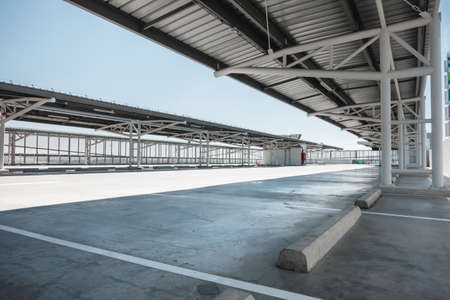 Car Parking Lot Area on Deck Floor of Shopping Mall, Perspective View Empty of Car Park Structure Building at Department Store. Auto Service Parking Lotsの写真素材