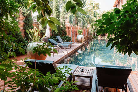 Backyard Swimming Pool for Outdoor Relaxing and Exercise, Contemporary Decor Architecture Design of Swim Pool With Terrace Poolside. Vacation Outdoors Leisure and Holiday Lifestyleのeditorial素材