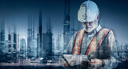 Infrastructure Construction Building and Engineering Futuristic Concept, Double Exposure of Construction Engineer With Modern Architecture City Skyscraper. Future Building Service and Architect Workの写真素材