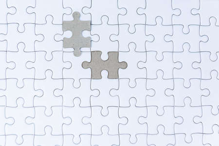 Jigsaw Puzzle Empty White Background, The Last Piece for Problem Solution Solving Teamwork. Metaphor Concept for Business Connection Challenge Success Team. Jigsaw Pattern Incomplete Backgroundsの写真素材