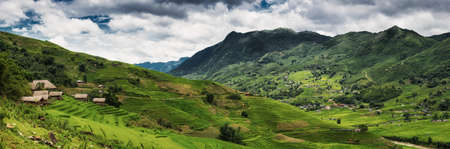 Panorama Scenery View of Agriculture Rice Fields, Nature Landscape of Rice Terrace Field at Sapa, Vietnam. Panorama Countryside Valley Scenic With Mountain of Agricultural Farmland Background.の写真素材