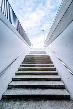 Staircase With Ladder Handrail Structure of Underground Walkway, Perspective Empty Staircase With Structural Concrete Design of Urban Stairway. Detail Entrance and Exit Stair of Underground Streetの写真素材