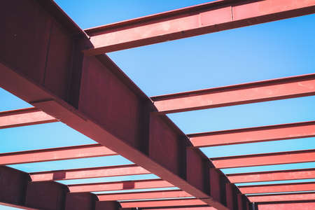 Steel Structure Beam Girder of Building at Construction Site, Metal I-Beam Erection Detail and Coat Painting Rust Resistant Under Construction. Steelwork Structural Engineering Design Assembly Workの写真素材