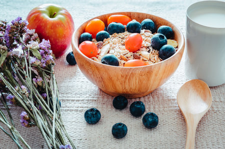 Homemade Granola Muesli Oatmeal for Breakfast Food, Granola With Fresh Fruit and Milk for Breakfast. Natural Baked Muesli and Mixing Fruits for Morning Meals. Diet Granola Homemade Meal for Healthyの写真素材