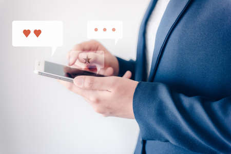 Technology Smartphone and Digital Application Network Concept, Business Woman Using Smart Phone While Chatting on Communication Social App. Multimedia Applications of Data Mobile Phone Connectionの写真素材