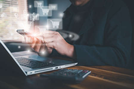Market E-commerce, Online Shopping Payment Concept. Business Woman Using Smartphone for Ordering Customers Purchase and Delivery Management on Ecommerce Network Connection. Business Online Shopの写真素材